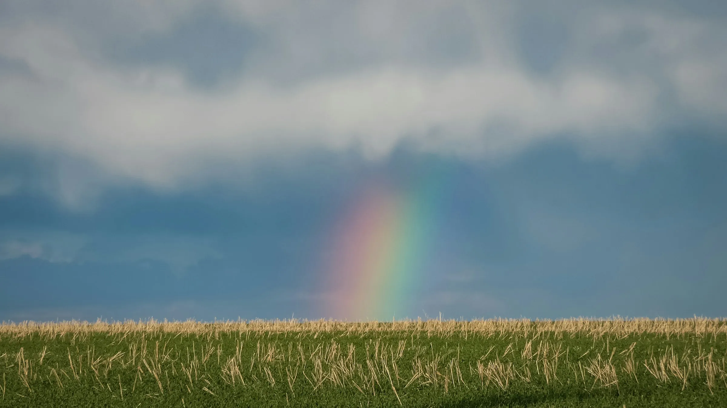A truck on a prairie highway south of Okotoks