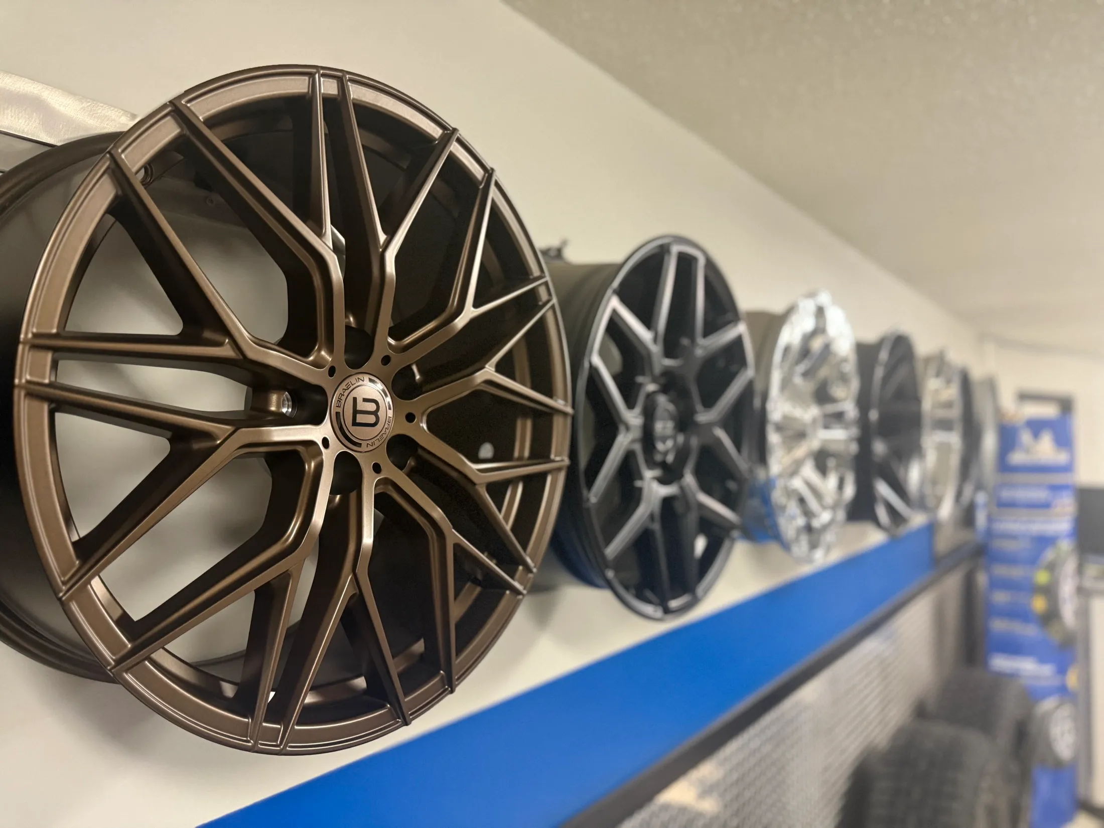 Bronze mesh wheel on the showroom wall